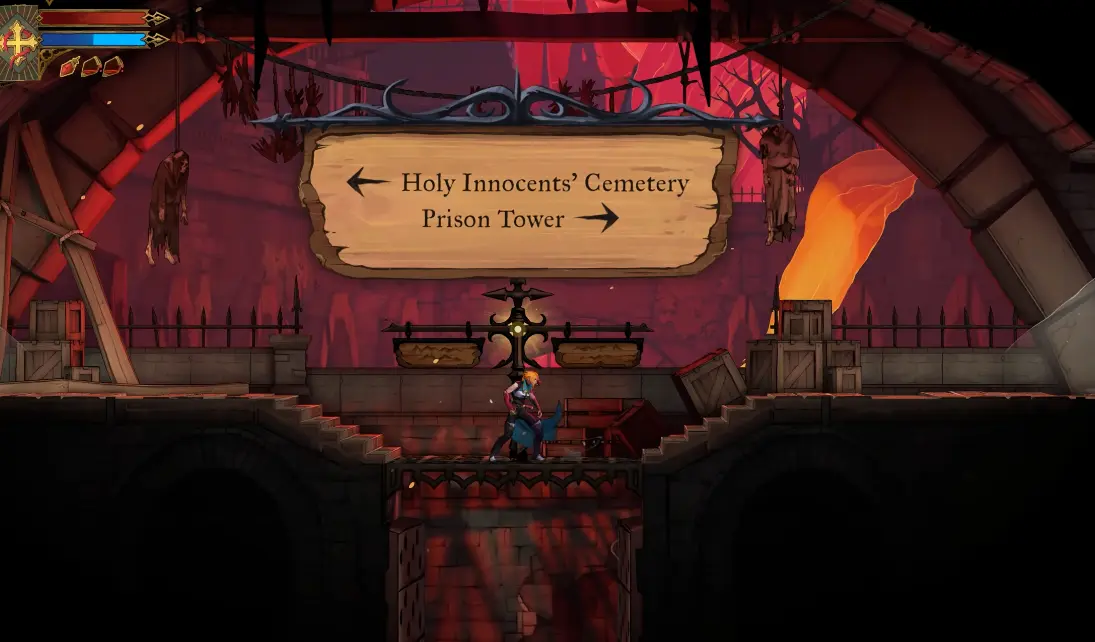 Signpost pointing left to Holy Innocents' Cemetery and right to Prison Tower