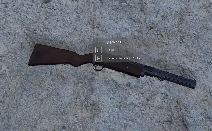 MP-18 submachine gun on the ground with its pickup label visible