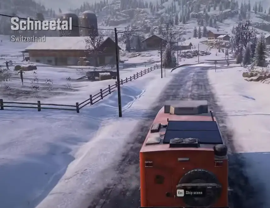 Entering Schneetal in SnowRunner Switzerland on a snow-covered village road