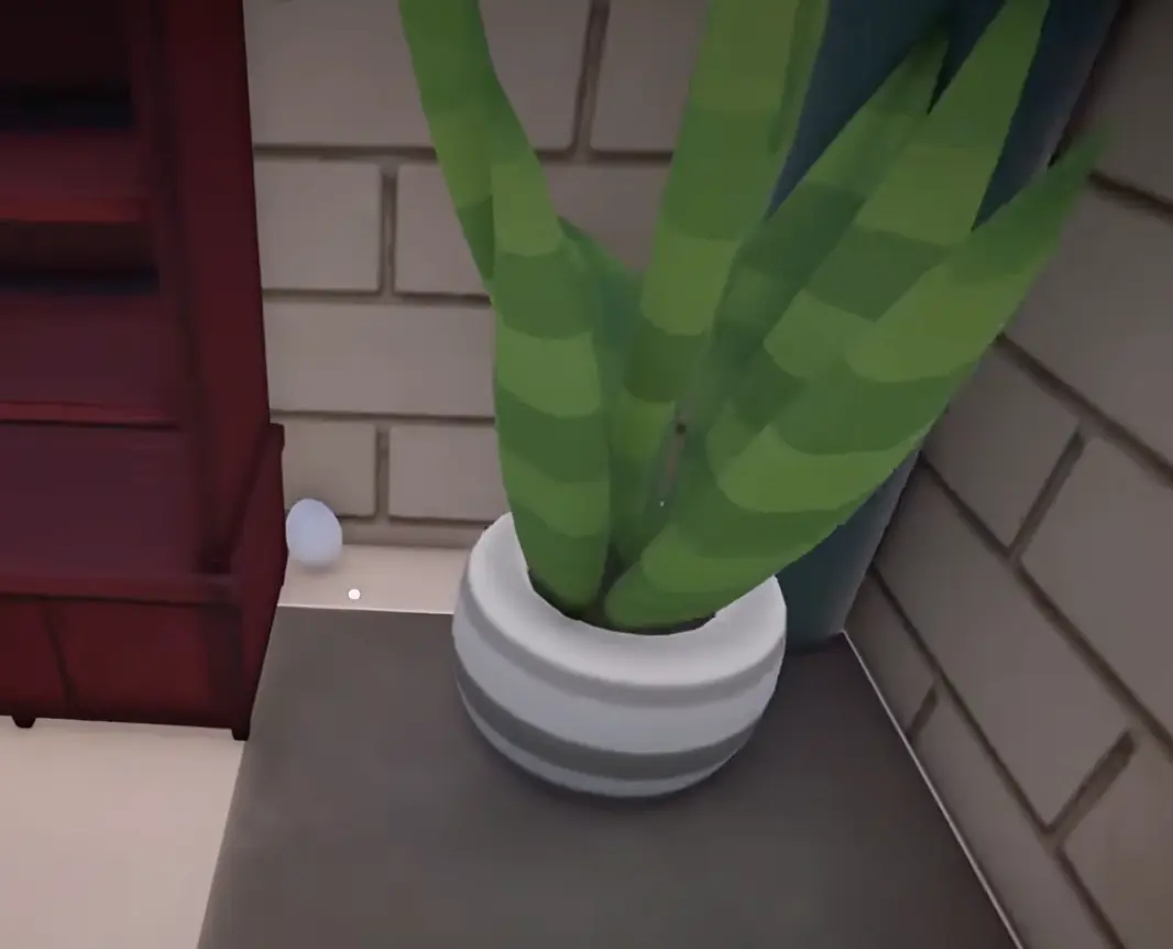 Hidden egg beside the plant near the Pirates shelf and office in Sort Them Ducks